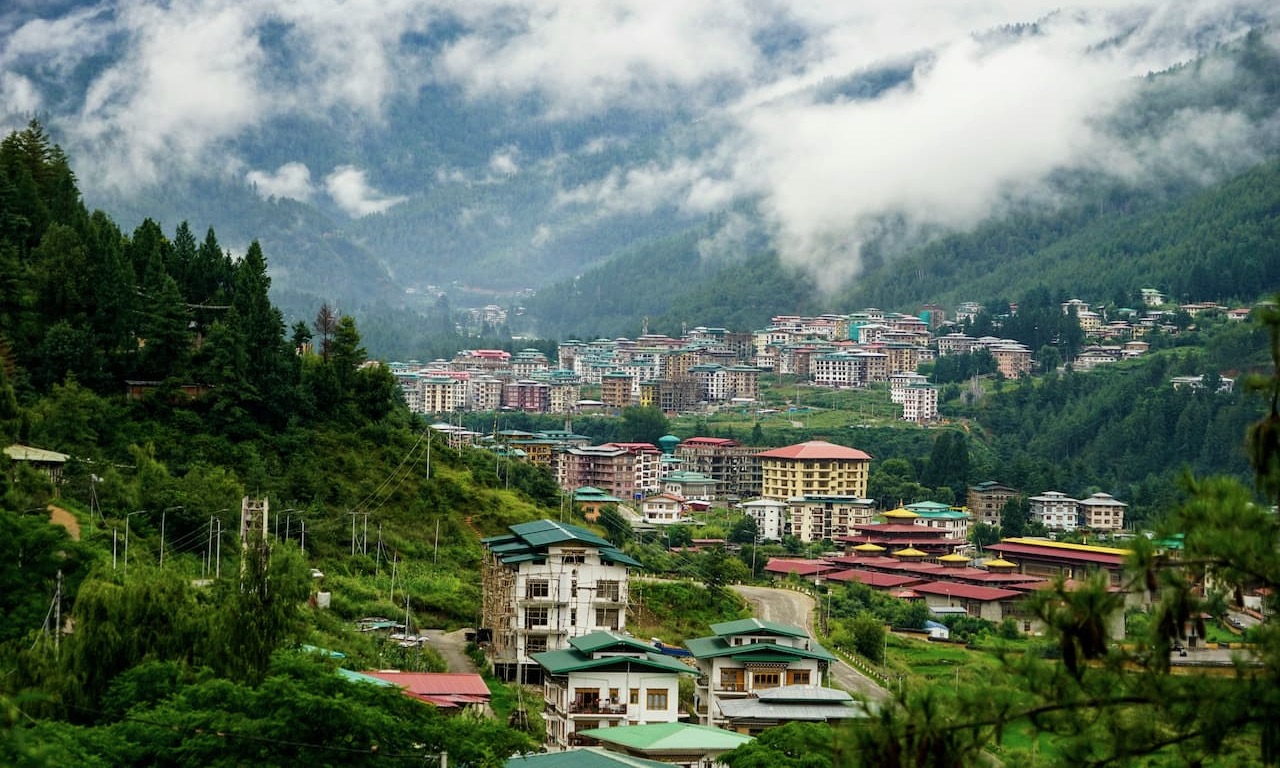 landscape of buildings and mountains in Bhutan